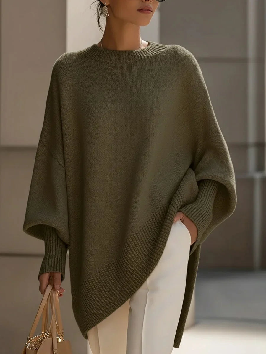 Women's knit crew neck sweater with asymmetrical hem