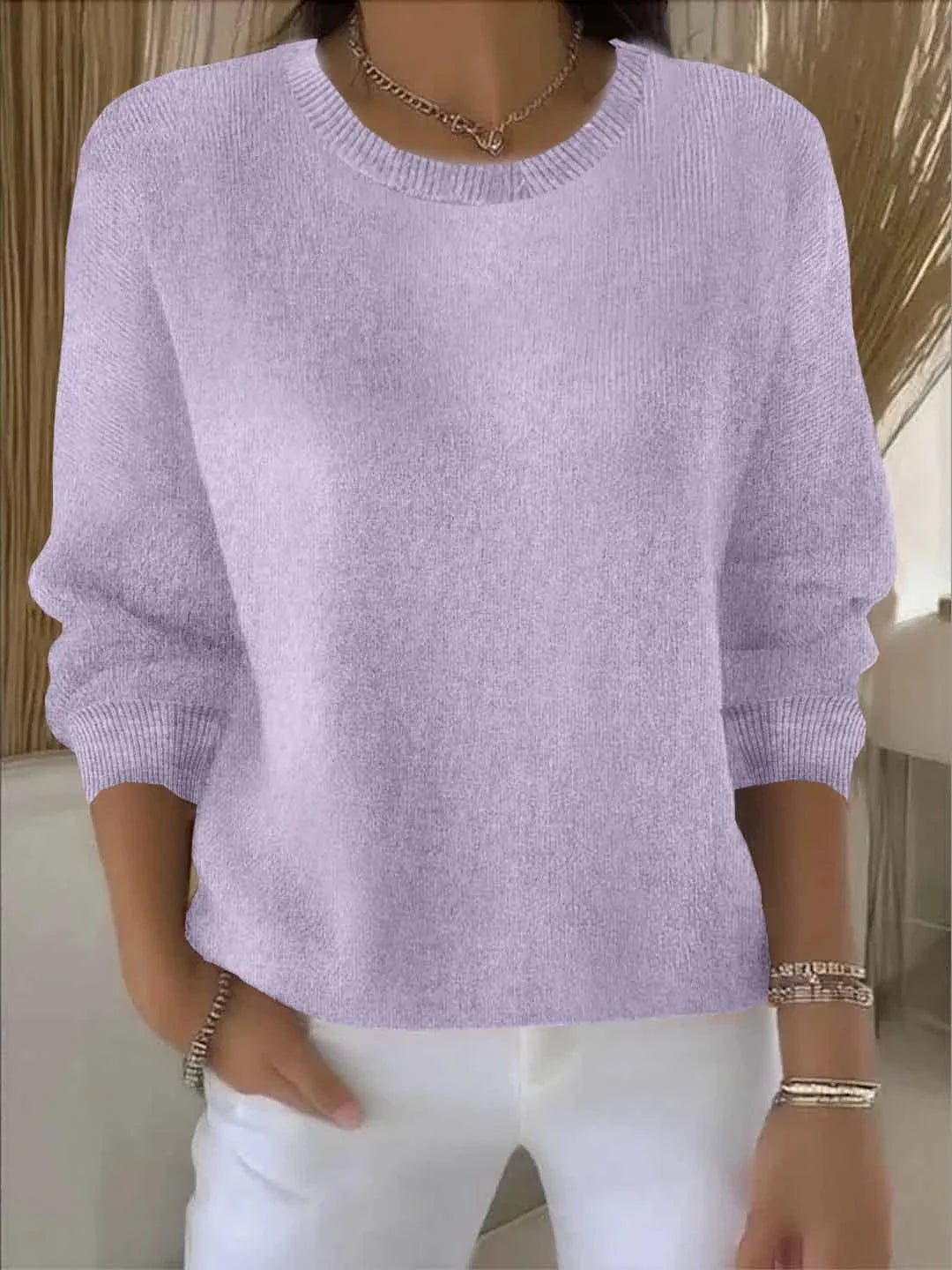 Women's knit crew neck sweater with ribbed cuffs and hem