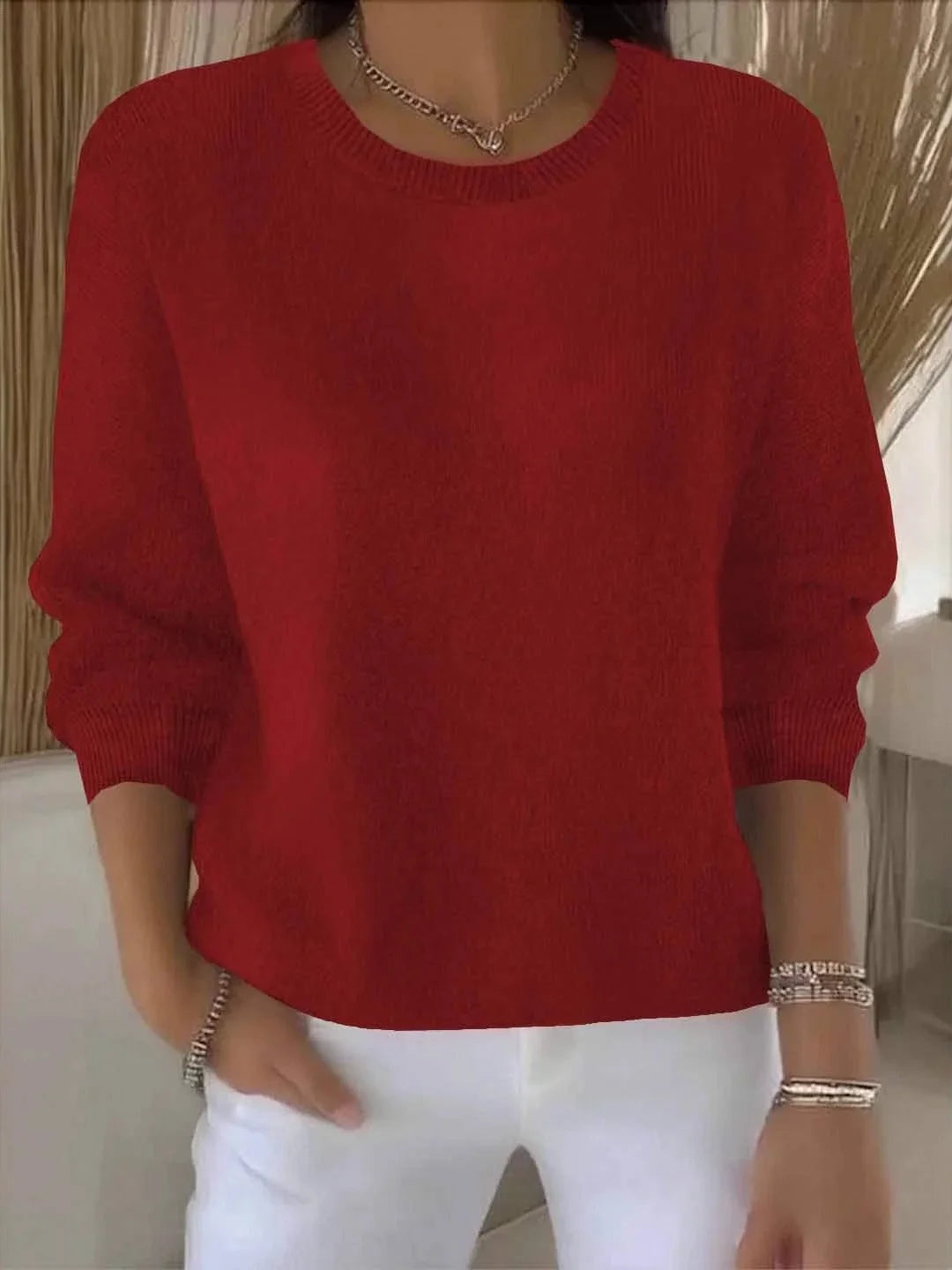 Women's knit crew neck sweater with ribbed cuffs and hem